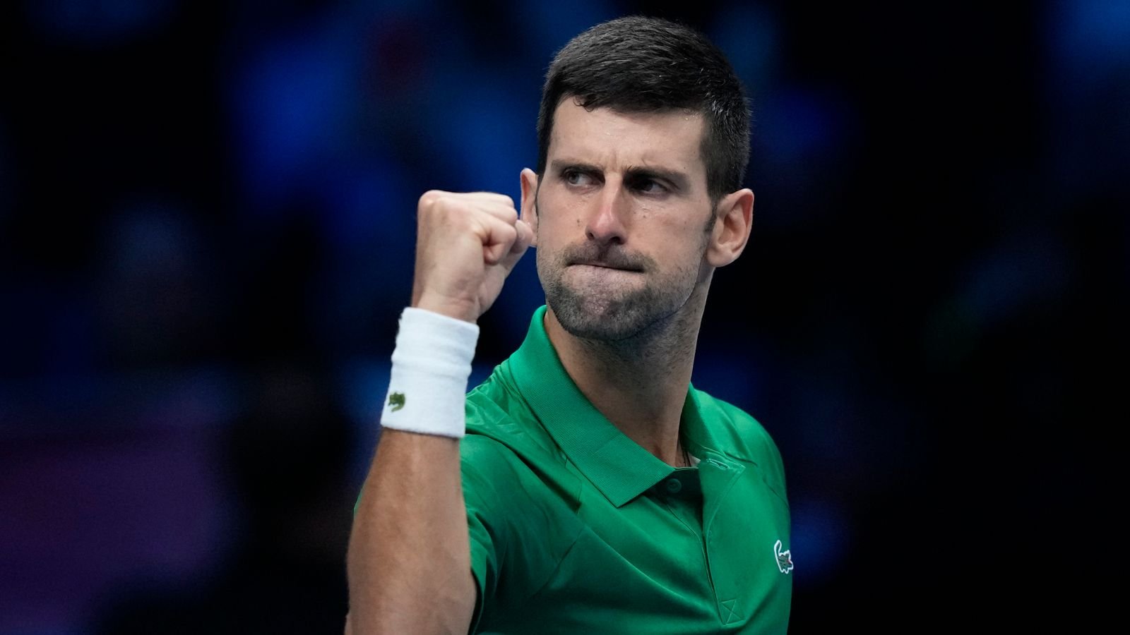 Serbia's Novak Djokovic celebrates after winning against Greece's Stefanos Tsitsipas