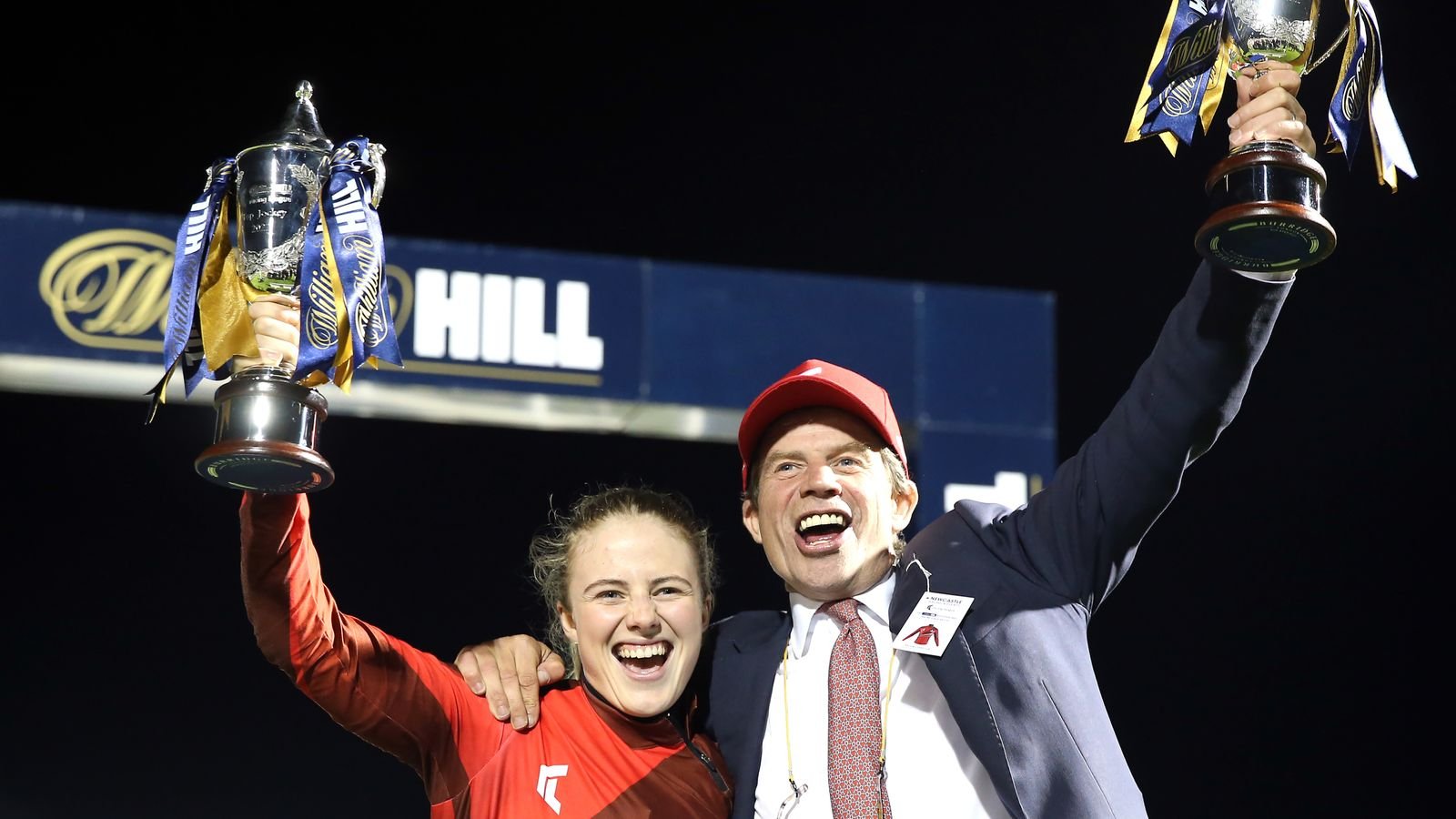 Saffie and Jamie Osborne celebrate victory in the Racing League