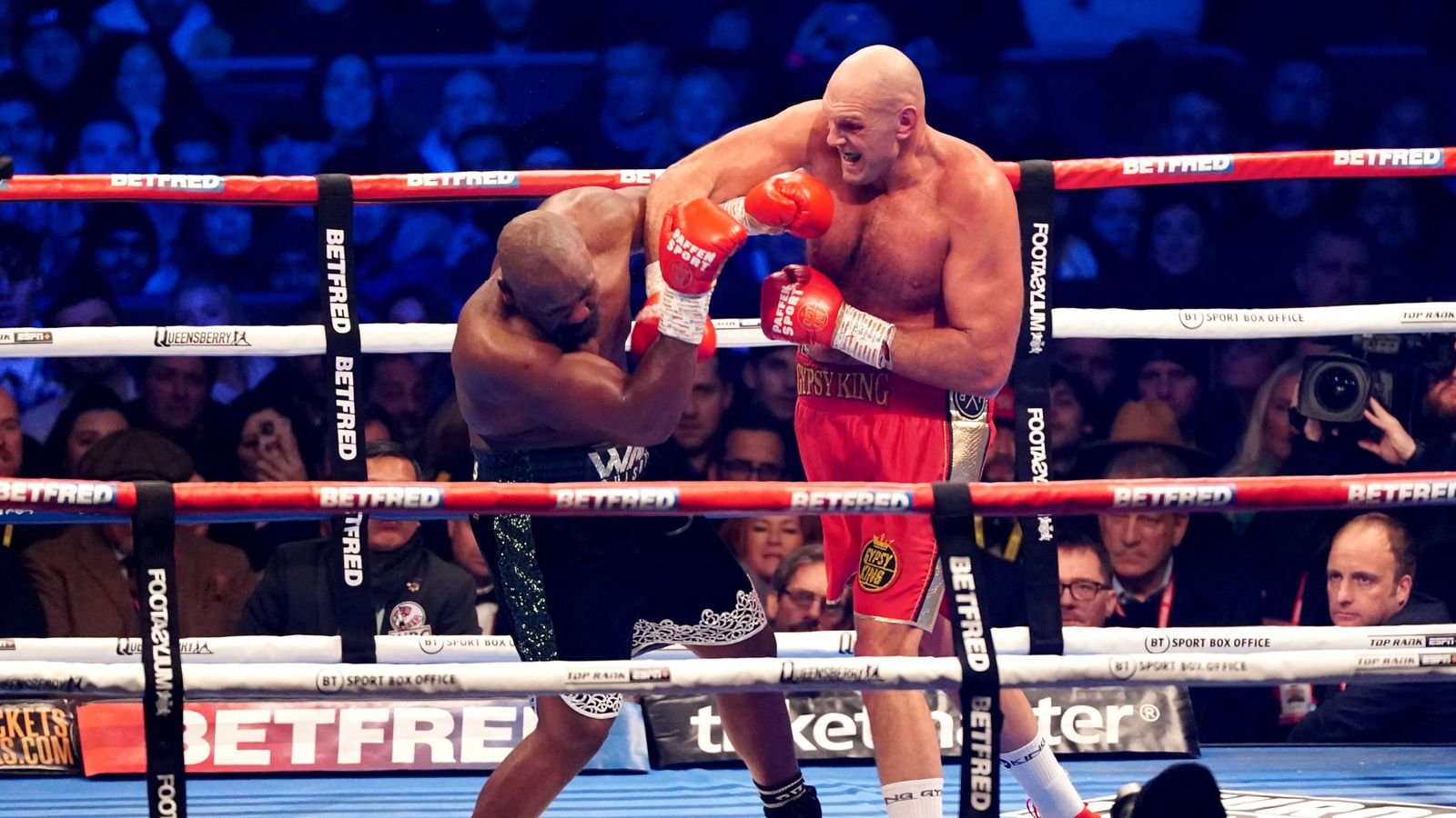 Tyson Fury lands a shot against Derek Chisora