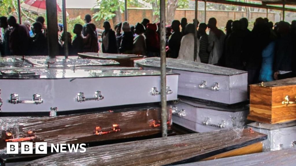Tropical Storm Freddy: Malawi rescue troops spend night on tree-top