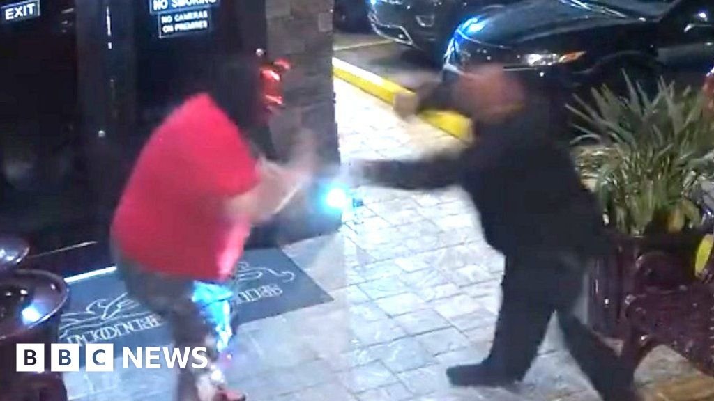 Masked man with gun stopped from entering strip club