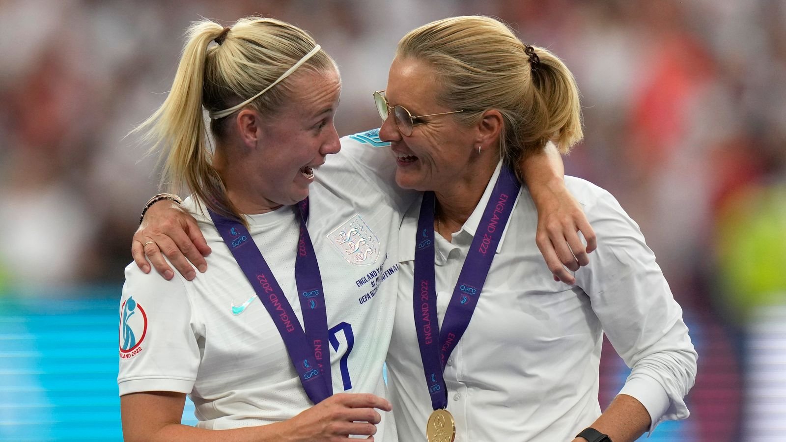 England's Beth Mead celebrates with England's manager Sarina Wiegman after winning the Women's Euro 2022 final soccer match between England and Germany at Wembley stadium in London, Sunday, July 31, 2022. England won 2-1. (AP Photo/Alessandra Tarantino)