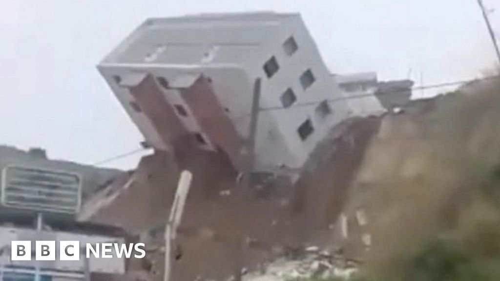 WATCH: Entire building tumbles onto road in Mexico