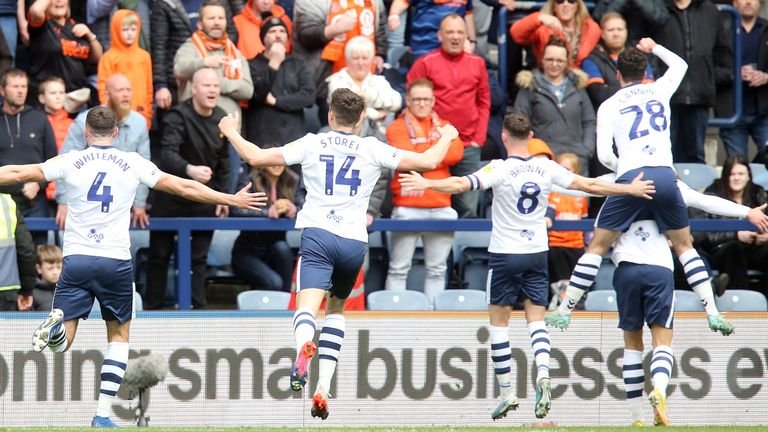 Preston players celebrate Brad Pott's opening goal against Blackpool