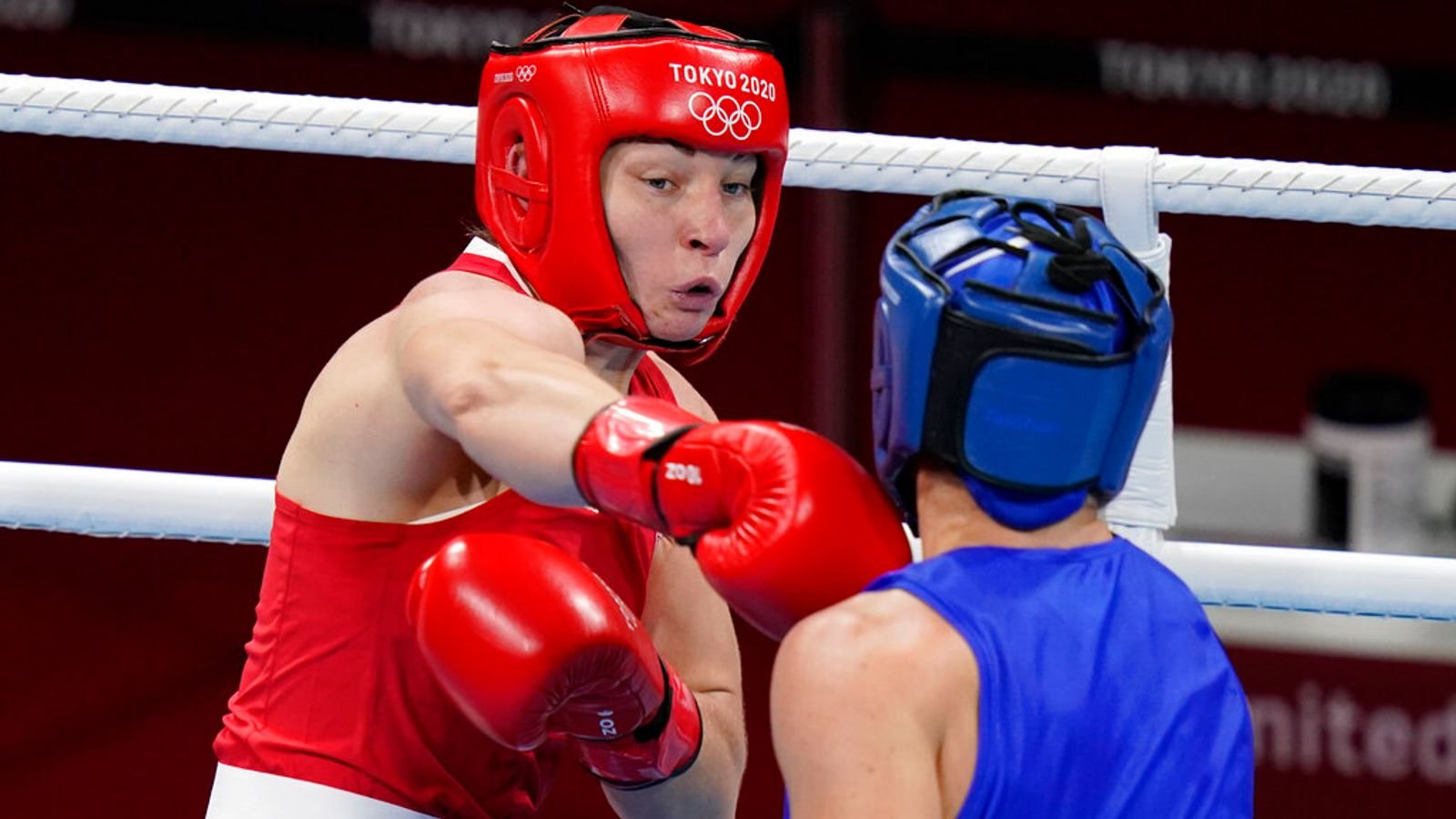 Britain...s Lauren Price, left, exchanges punches with Nouchka Fontlijn, of the Netherlands, during their women...s middleweight 75-kg boxing match at the 2020 Summer Olympics, Friday, Aug. 6, 2021, in Tokyo, Japan. (AP Photo/Frank Franklin II)
