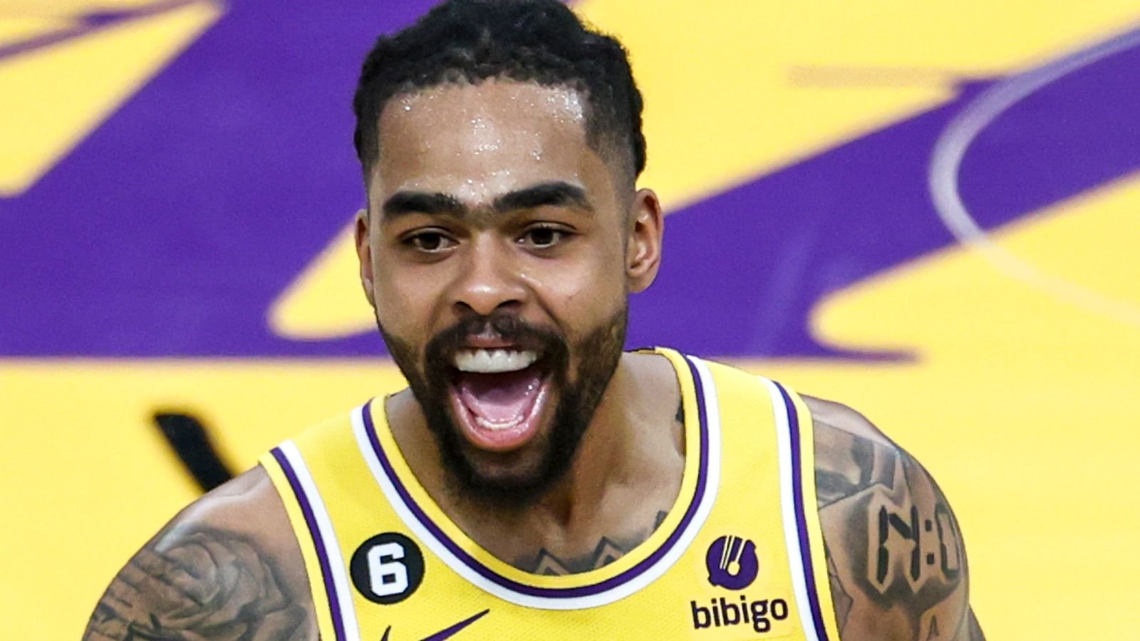 Los Angeles Lakers guard D'Angelo Russell (1) celebrates after scoring against the Memphis Grizzlies during an NBA basketball playoffs round one game 6 Friday, April 28, 2023, in Los Angeles. (Ringo Chiu via AP)