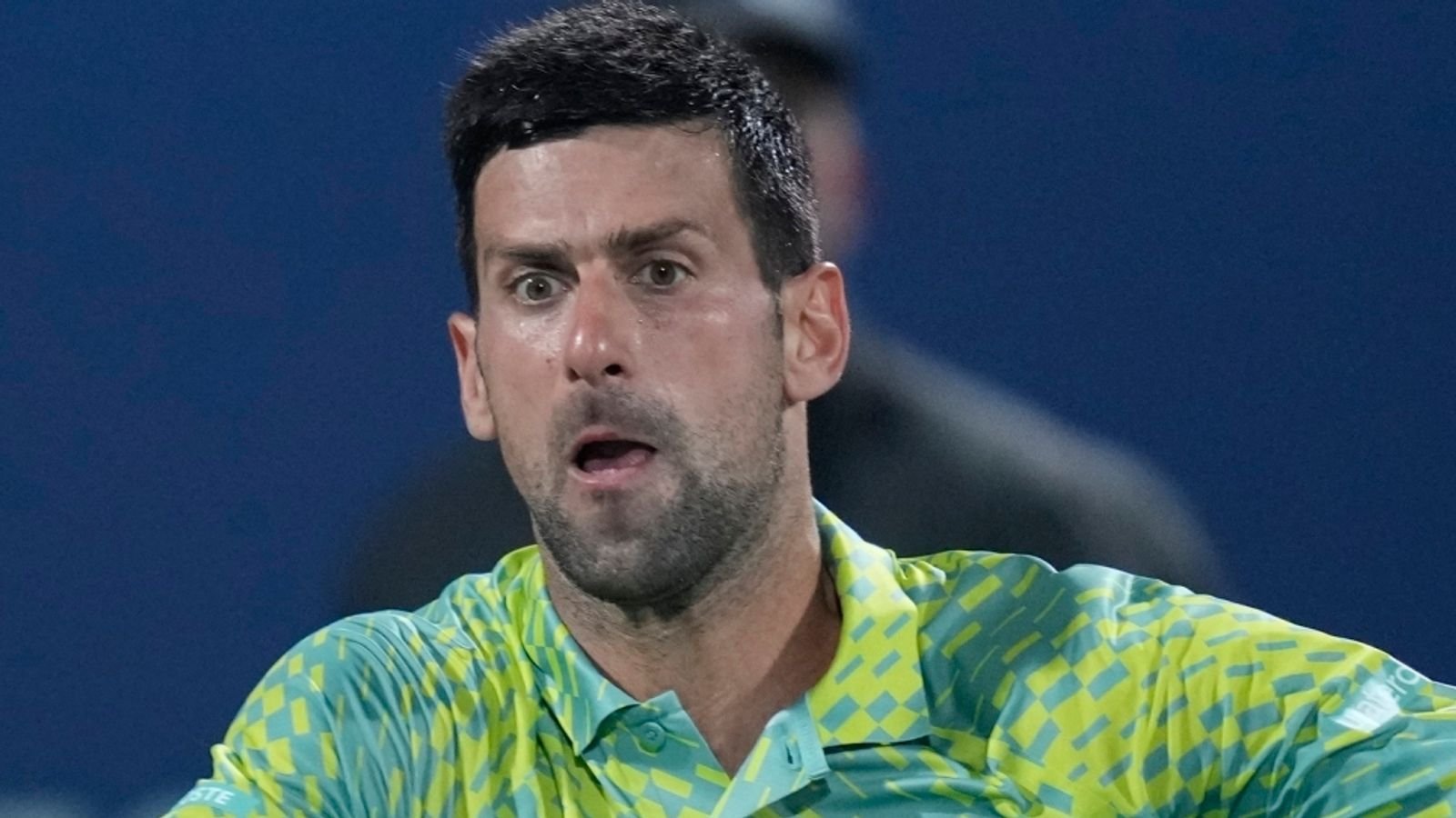 Serbia's Novak Djokovic returns the ball to Poland's Hubert Hurkacz during their quarter final match of the Dubai Duty Free Tennis Championships in Dubai, United Arab Emirates, Thursday, March 1, 2023. (AP Photo/Kamran Jebreili)