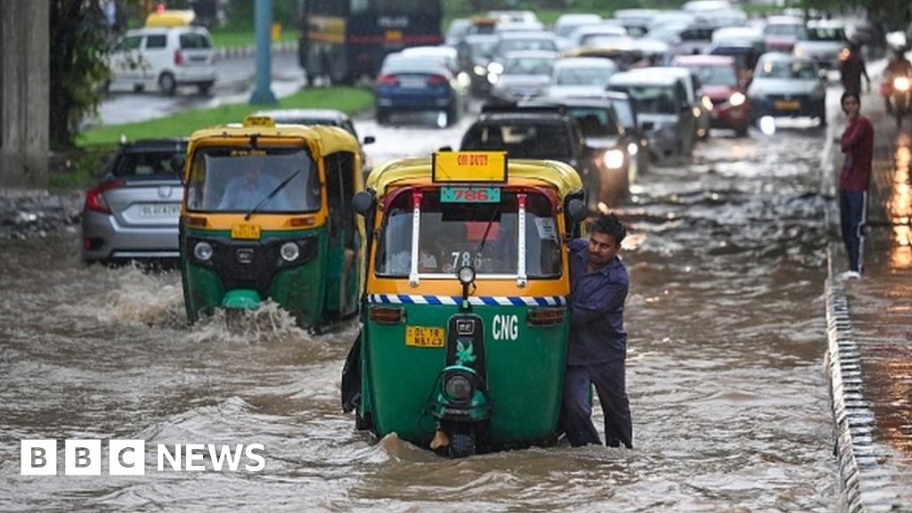 Flood warning in Delhi as rains batter north India