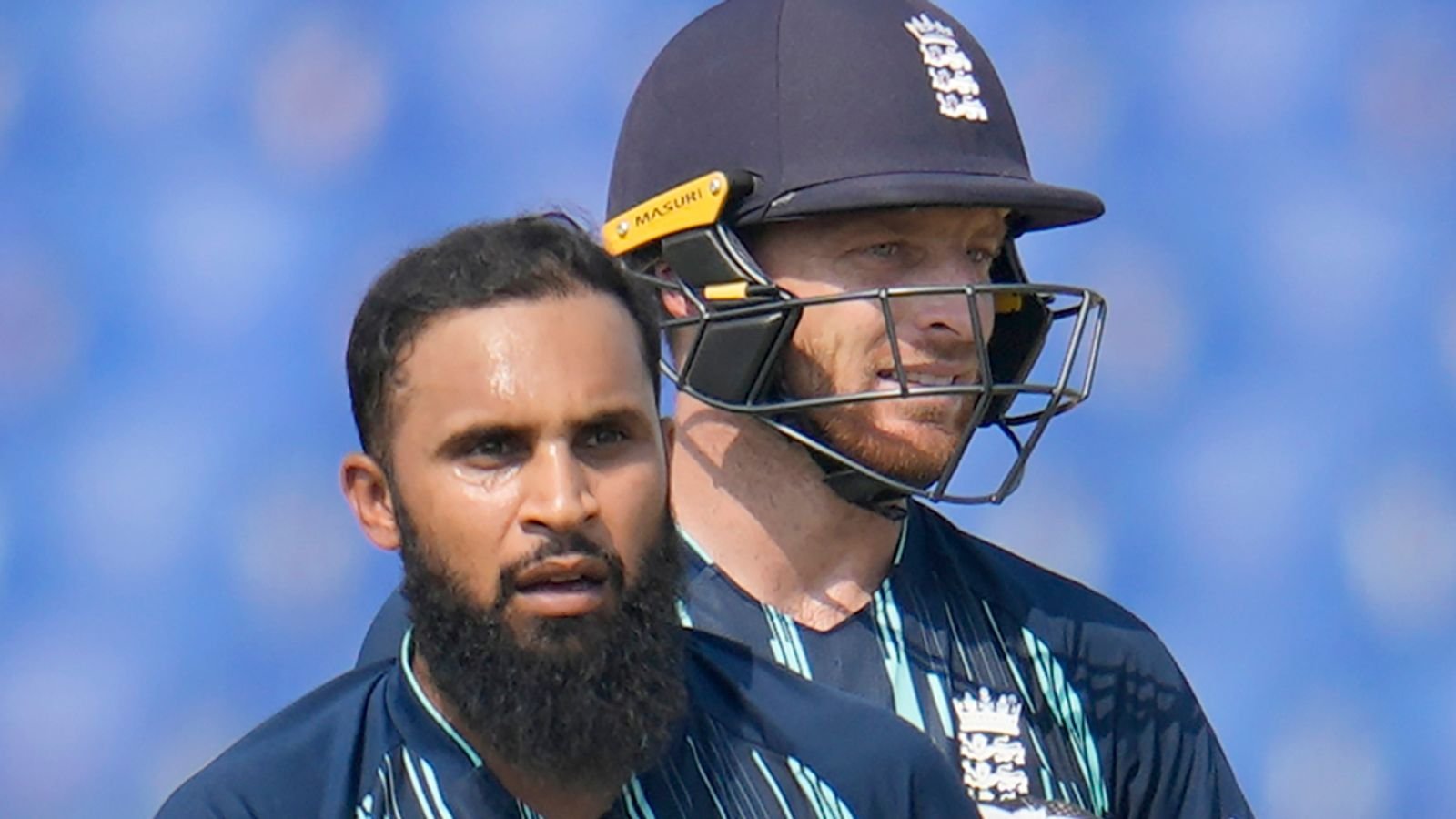 England's Adil Rashid, second right, celebrates with teammates the dismissal of Bangladesh's Mushfiqur Rahim during the third one day international cricket match between Bangladesh and England in Chattogram, Bangladesh, Monday, March 6, 2023. (AP Photo/Aijaz Rahi)