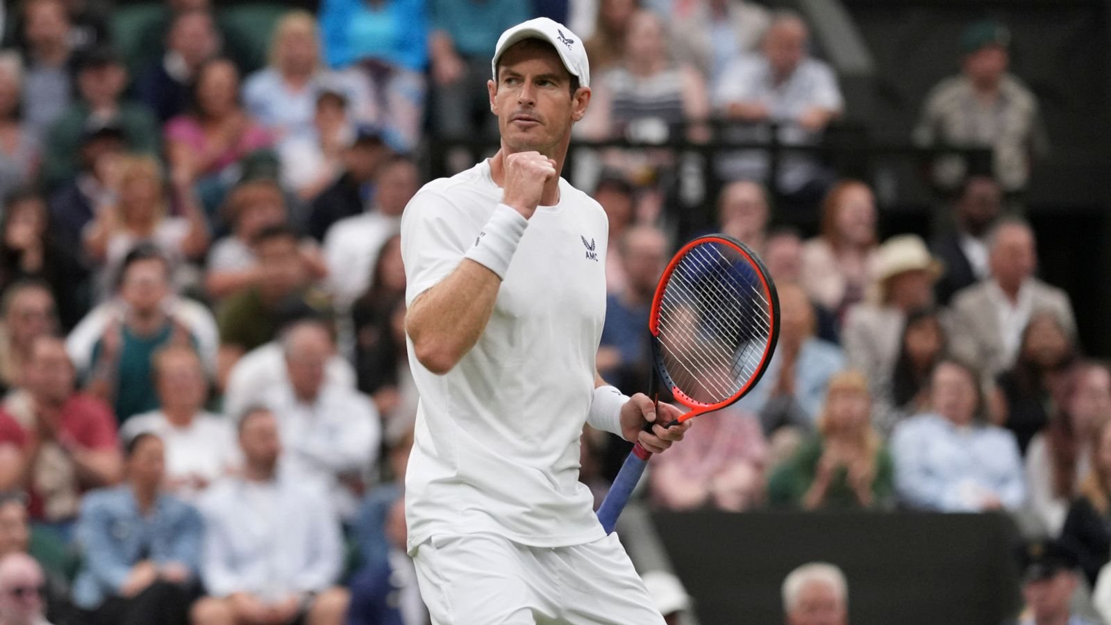 Britain's Andy Murray celebrates winning a point from Britain's Ryan Peniston during the first round men's singles match on day two of the Wimbledon tennis championships in London, Tuesday, July 4, 2023. (AP Photo/Alberto Pezzali)