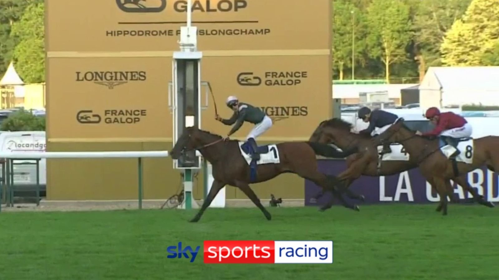 Cristian Demuro celebrates as Feed The Flame wins the Grand Prix de Paris