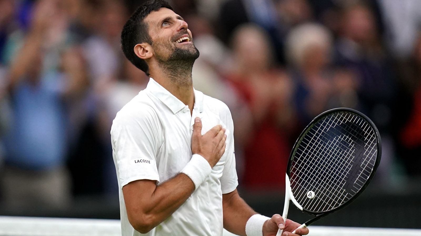 Novak Djokovic celebrates victory over Jannik Sinner following the Gentlemen's Singles semi-final match on day twelve of the 2023 Wimbledon Championships at the All England Lawn Tennis and Croquet Club in Wimbledon. Picture date: Friday July 14, 2023.