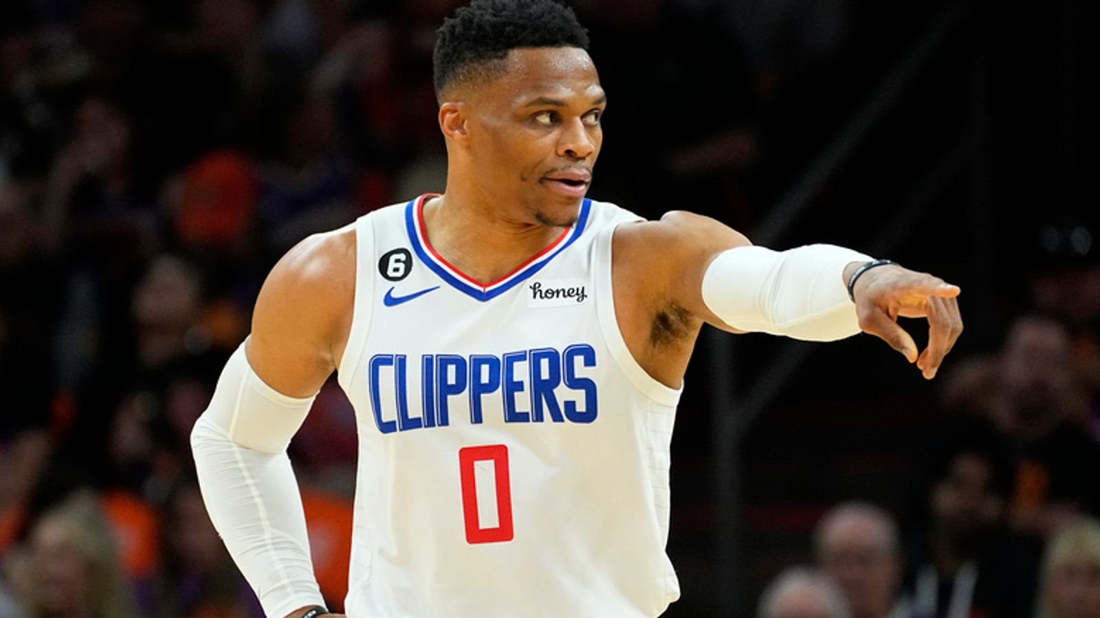 Los Angeles Clippers guard Russell Westbrook (0) motions to a teammate during Game 5 of a first-round NBA basketball playoff series against the Phoenix Suns, Tuesday, April 25, 2023, in Phoenix. (AP Photo/Matt York)