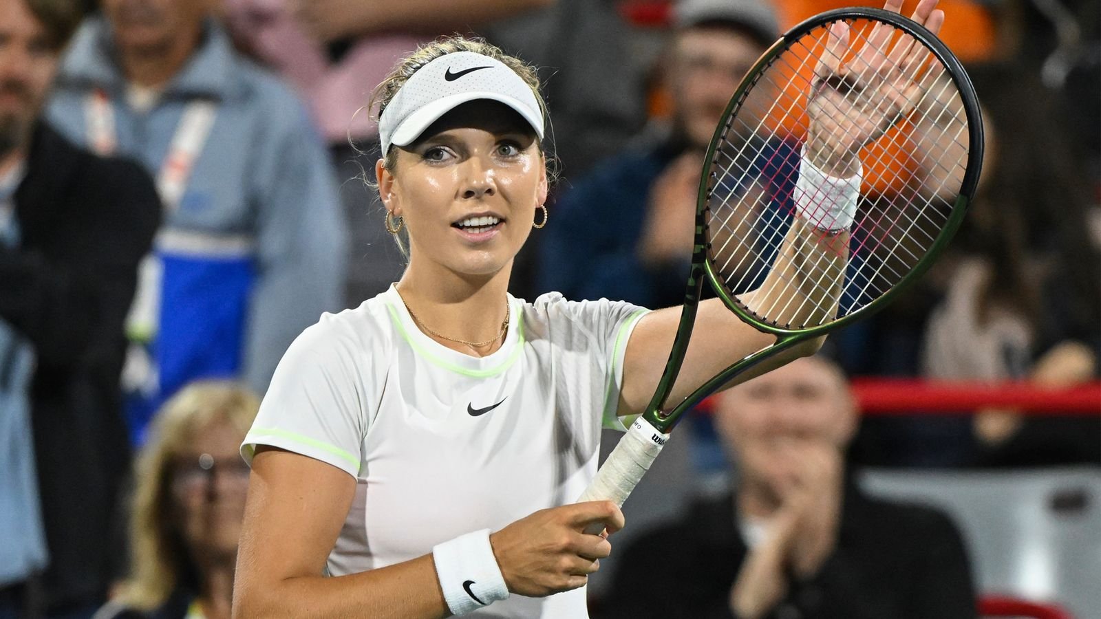 Katie Boulter, from United Kingdom, salutes the crowd after winning her first-round women's match against Rebecca Marino, from Canada, at the National Bank Open tennis tournament in Montreal, Monday, Aug. 7, 2023. (Graham Hughes/The Canadian Press via AP)