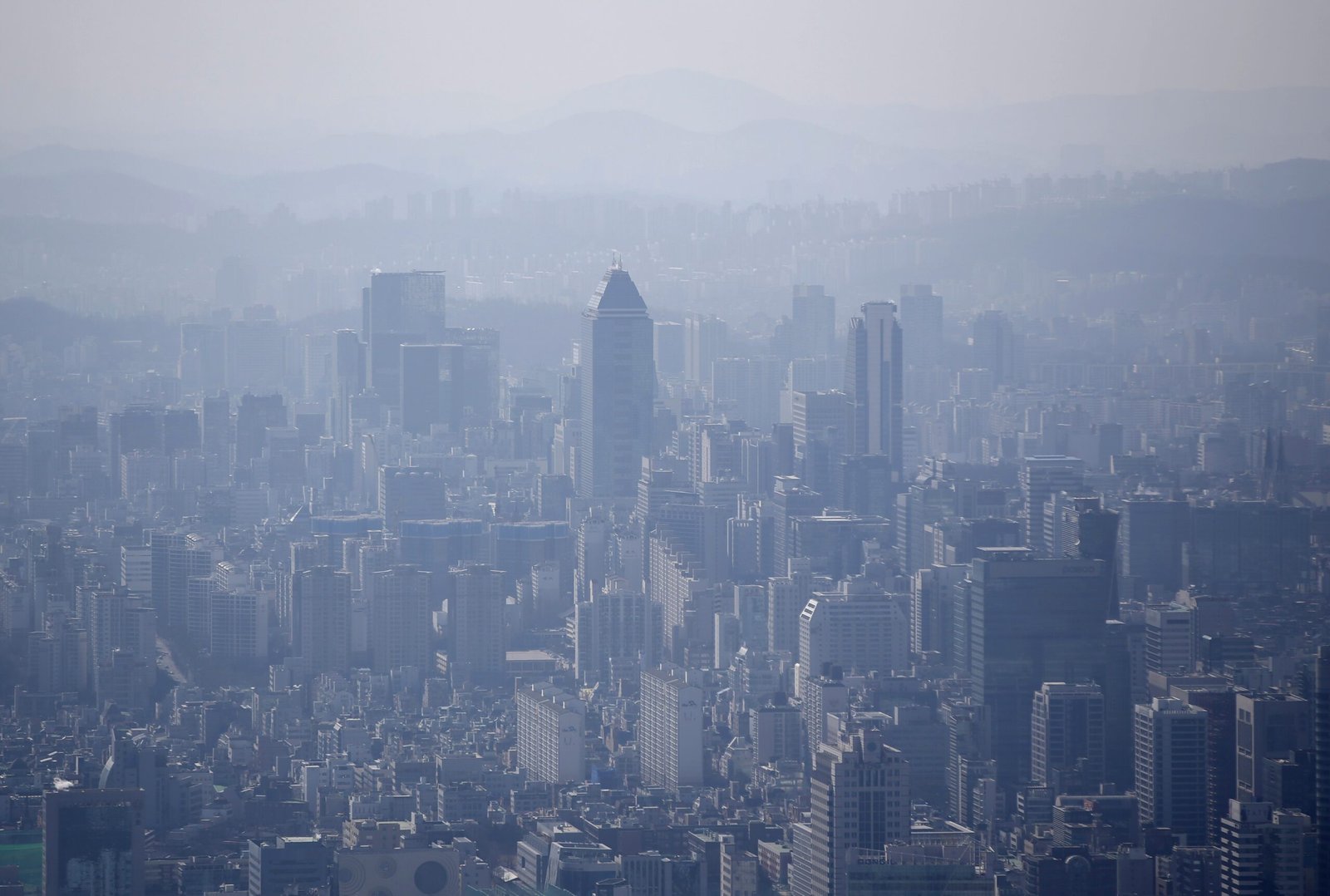 The skyline of central Seoul is seen during a foggy day in Seoul March 4, 2015. South Korea